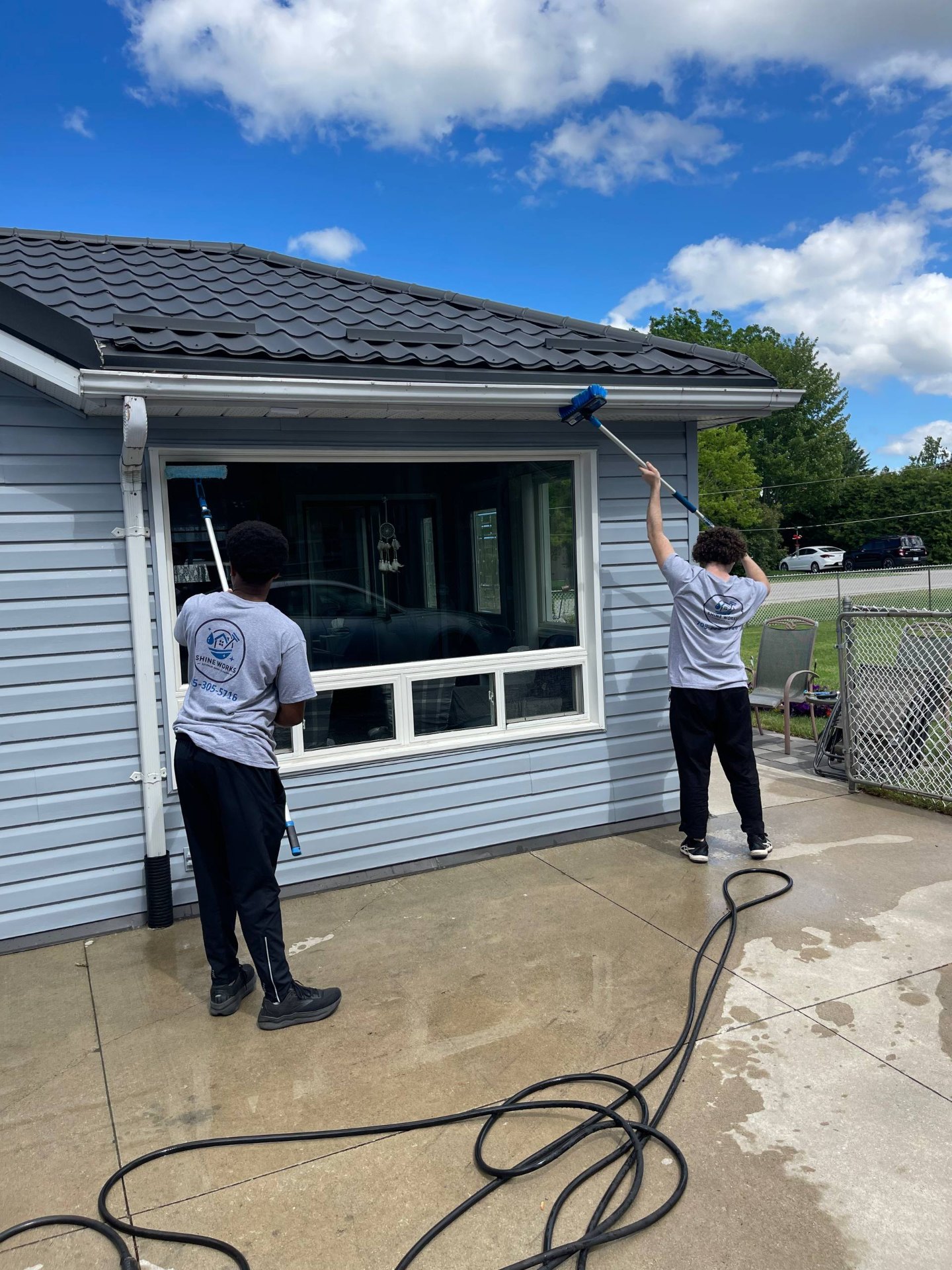 Shine Works window cleaning in progress on a Simcoe County property